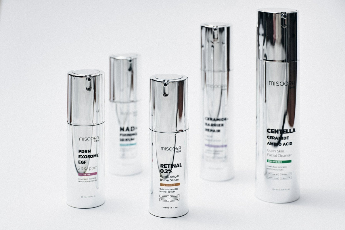 The five MISOORA bottles standing in a row on a white surface