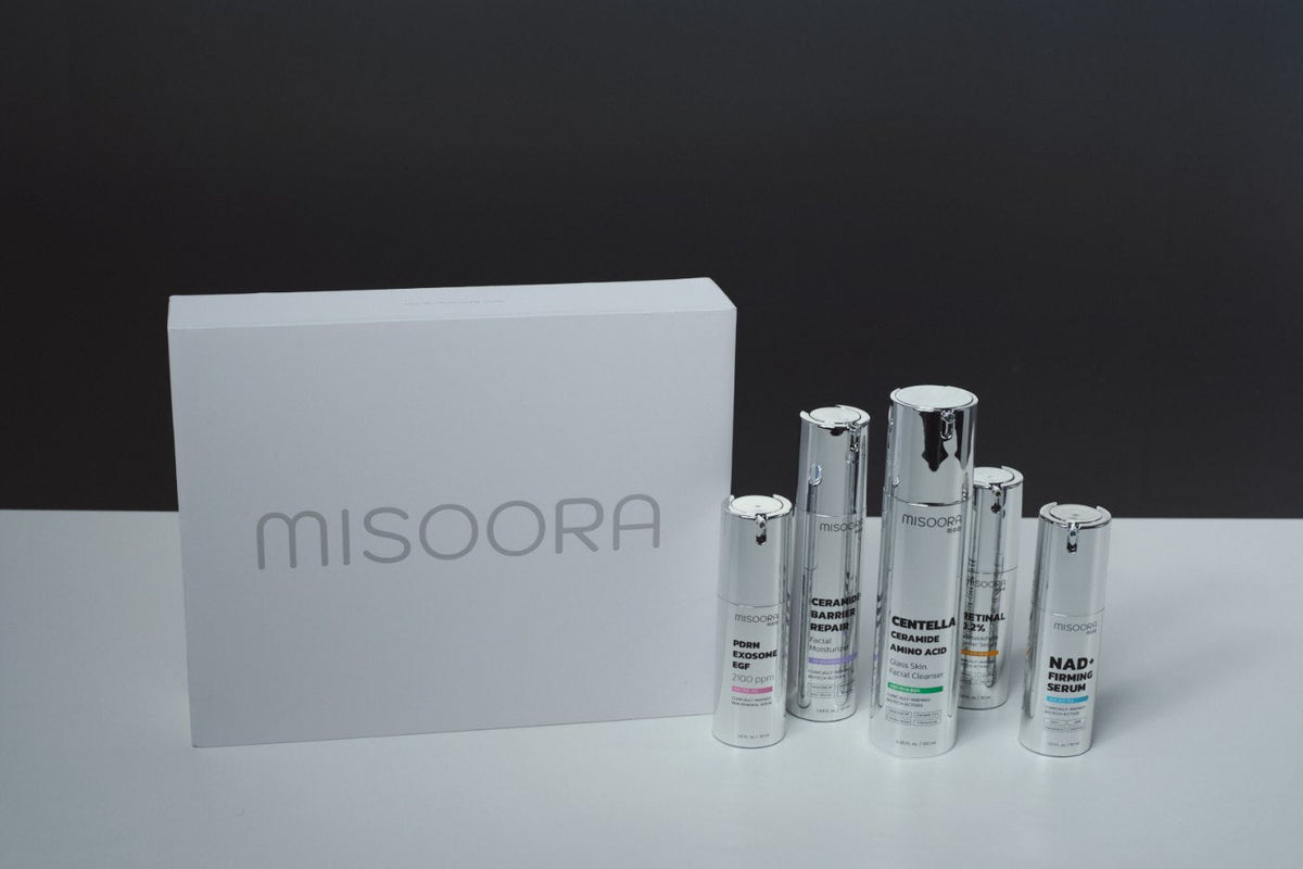 Woman in her 50s with the MISOORA box and serum lineup